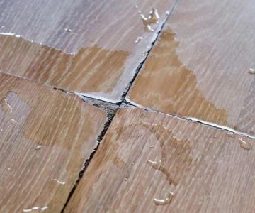 Water Damage Repair for Hardwood and Laminate Floors: A Complete Guide