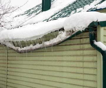 How to Prevent Water Damage from Ice Dams in Your Roof